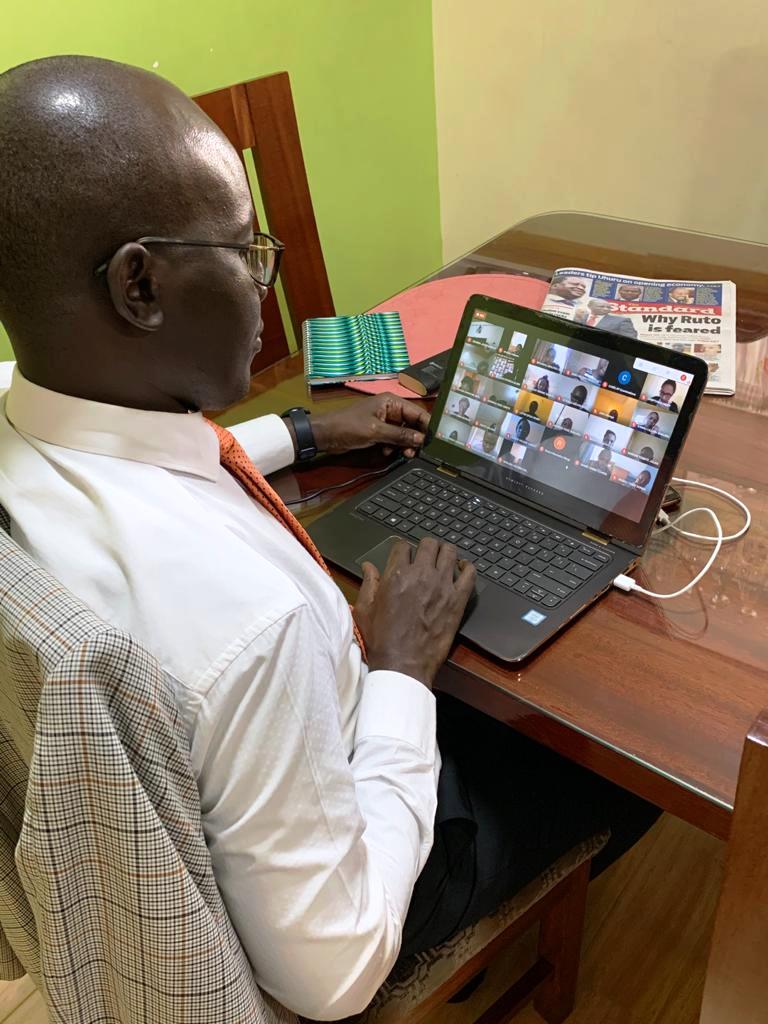 Dr Odote Closely monitoring Historic Online Exams from Home
